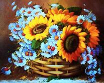 Подсолнухи и ромашки в корзине